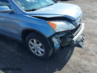 2009 Honda CR-V EX-L with VIN 5J6RE48799L065209, listed as a IAAI auction lot 41868398 with 111,385 mi miles. Bid and sale history available at carsss.com. Image 18.