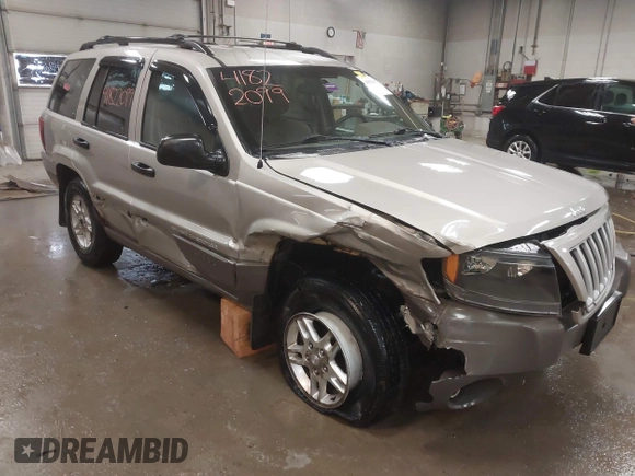 2004 Jeep Grand Cherokee Laredo with VIN 1J4GW48S44C321869, listed as a IAAI auction lot 41822099 with 181,663 mi miles. Bid and sale history available at carsss.com. Image 6.