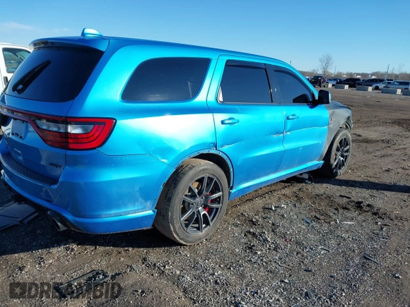 2018 Dodge Durango SRT z VIN 1C4SDJGJ1JC415720, wystawiony jako IAAI lot #41193674 z przebiegiem 63 140 mil mil oraz . Historia ofert i sprzedaży dostępna na DreamBid. Obrazek 4.