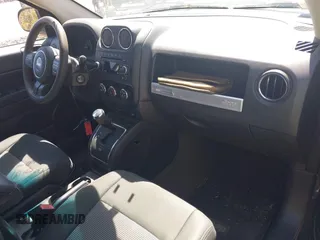 2014 Jeep Compass Sport with VIN 1C4NJDBB4ED689503, listed as a IAAI auction lot 42079098 with 104,433 mi miles. Bid and sale history available at carsss.com. Image 5.