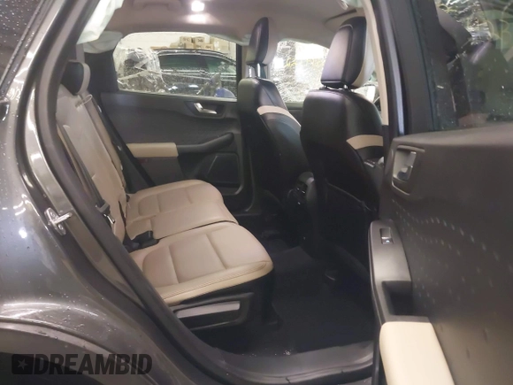 2020 Ford Escape Titanium with VIN 1FMCU9J95LUA39338, listed as a IAAI auction lot 42319122 with 34,631 mi miles and . Bid and sale history available at DreamBid. Image 8.