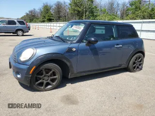 2010 MINI Hardtop with VIN WMWMF3C57ATU79474, listed as a Copart auction lot 61860865 with 137,965 mi miles and Clean title. Bid and sale history available at DreamBid. Image 1.