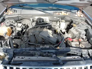 2008 Mercury Mariner with VIN 4M2CU91168KJ37290, listed as a IAAI auction lot 41199062 with 142,232 mi miles. Bid and sale history available at carsss.com. Image 10.