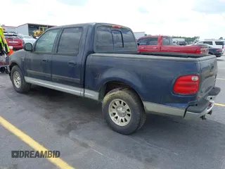 2003 Ford F-150 XLT with VIN 1FTRW076X3KC61967, listed as a IAAI auction lot 42016065 with 206,256 mi miles. Bid and sale history available at carsss.com. Image 3.