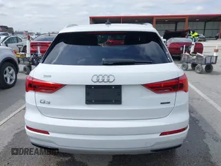 2021 Audi Q3 Premium with VIN WA1AUCF33M1096437, listed as a IAAI auction lot 41910411 with 86,837 mi miles and . Bid and sale history available at DreamBid. Image 17.