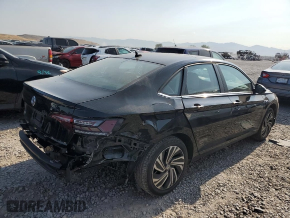 2021 Volkswagen Jetta SEL z VIN 3VWE57BU5MM013374, wystawiony jako Copart lot #62359125 z przebiegiem 50 969 mil mil oraz Czysty tytuł • Clean title. Historia ofert i sprzedaży dostępna na DreamBid. Obrazek 3.