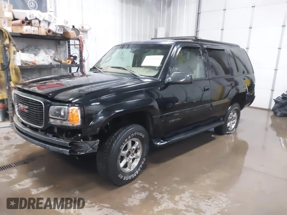 2000 GMC Denali with VIN 1GKEK13R9YR163824, listed as a IAAI auction lot 41245808 with 206,773 mi miles. Bid and sale history available at carsss.com. Image 19.