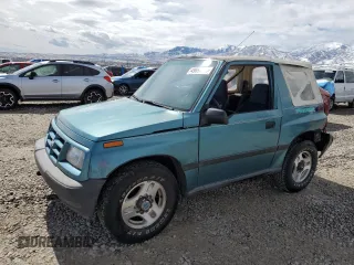 1996 Chevrolet Tracker z VIN 2CNBJ1869T6903615, wystawiony jako Copart lot #49690055 z przebiegiem 144 821 mil mil oraz Szkoda całkowita • Salvage title. Historia ofert i sprzedaży dostępna na DreamBid. Obrazek 1.