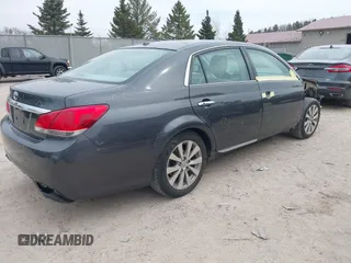 2011 Toyota Avalon with VIN 4T1BK3DB8BU392152, listed as a IAAI auction lot 41991123 with 147,297 mi miles and . Bid and sale history available at carsss.com. Image 4.