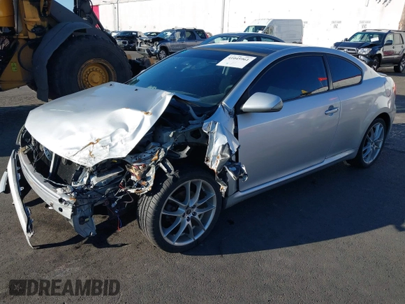 2005 Scion tC z VIN JTKDE177750019561, wystawiony jako IAAI lot #41045961 z przebiegiem Nie podano mil oraz . Historia ofert i sprzedaży dostępna na DreamBid. Obrazek 17.