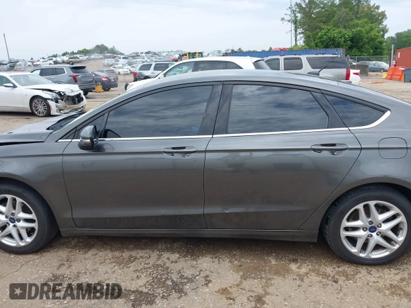 2016 Ford Fusion SE z VIN 3FA6P0H77GR367727, wystawiony jako IAAI lot #42274323 z przebiegiem 309 852 mil mil oraz . Historia ofert i sprzedaży dostępna na DreamBid. Obrazek 15.
