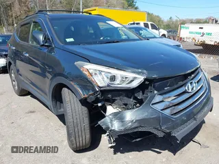 2014 Hyundai Santa Fe z VIN 5XYZUDLB5EG155208, wystawiony jako IAAI lot #42105755 z przebiegiem 138 238 mil mil oraz . Historia ofert i sprzedaży dostępna na DreamBid. Obrazek 1.