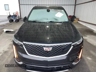 2020 Cadillac XT6 FWD Premium Luxury with VIN 1GYKPCRS9LZ177120, listed as a IAAI auction lot 41608960 with 63,109 mi miles and . Bid and sale history available at DreamBid. Image 6.