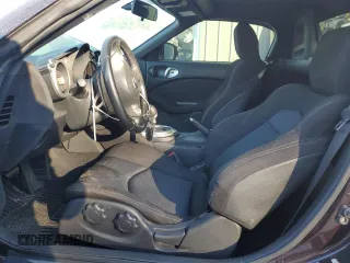 2010 Nissan 370Z Touring с VIN JN1AZ4FH0AM301069, выставлен на аукционе Copart как лот 82912404 с пробегом 55 803 миль миль и Списание • Salvage title. История ставок и продаж доступна на DreamBid. Изображение 7.