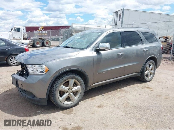 2011 Dodge Durango Citadel with VIN 1D4RE5GG5BC664579, listed as a IAAI auction lot 40812809 with 209,743 mi miles. Bid and sale history available at carsss.com. Image 2.