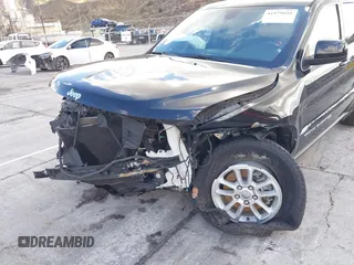 2020 Jeep Grand Cherokee Altitude with VIN 1C4RJEAG5LC182150, listed as a IAAI auction lot 41579551 with 57,789 mi miles and . Bid and sale history available at DreamBid. Image 6.