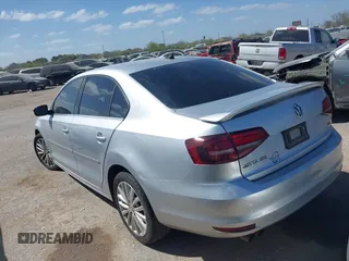 2016 Volkswagen Jetta Sedan 1.8T SEL with VIN 3VWL07AJ0GM330058, listed as a IAAI auction lot 41832211 with 1 mi miles. Bid and sale history available at carsss.com. Image 3.