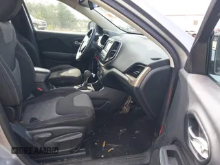 2014 Jeep Cherokee Sport with VIN 1C4PJLAB2EW163332, listed as a IAAI auction lot 41752003 with 154,832 mi miles and . Bid and sale history available at DreamBid. Image 5.