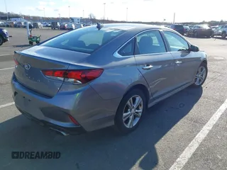 2018 Hyundai Sonata SEL with VIN 5NPE34AFXJH718120, listed as a IAAI auction lot 41847879 with 84,408 mi miles and . Bid and sale history available at carsss.com. Image 4.