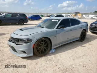 2022 Dodge Charger R/T with VIN 2C3CDXCT0NH153713, listed as a Copart auction lot 61682635 with 38,817 mi miles and Salvage title. Bid and sale history available at DreamBid. Image 1.