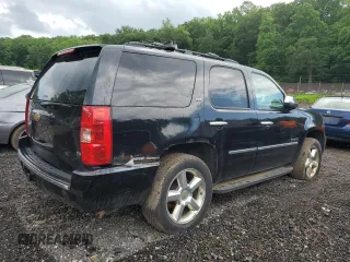 2010 Chevrolet Tahoe LTZ with VIN 1GNUKCE05AR164175, listed as a Copart auction lot 57223295 with 423,010 mi miles and Salvage title. Bid and sale history available at DreamBid. Image 3.