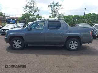 2008 Honda Ridgeline RTL z VIN 2HJYK16548H517715, wystawiony jako IAAI lot #41818060 z przebiegiem 239 399 mil mil oraz . Historia ofert i sprzedaży dostępna na DreamBid. Obrazek 14.