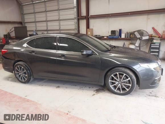 2015 Acura TLX Technology with VIN 19UUB2F53FA011945, listed as a IAAI auction lot 42012562 with 96,623 mi miles and . Bid and sale history available at DreamBid. Image 13.