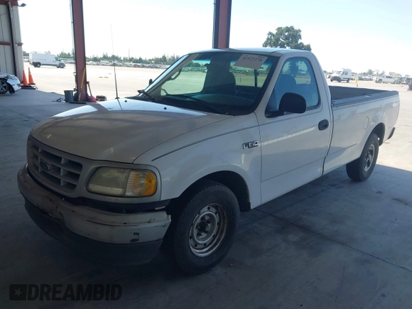 1999 Ford F-150 with VIN 1FTZF1721XKB63483, listed as a IAAI auction lot 42327278 with Not provided miles and . Bid and sale history available at DreamBid. Image 2.