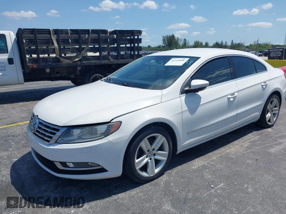 2013 Volkswagen CC Sport with VIN WVWBN7AN7DE559146, listed as a IAAI auction lot 42229896 with 152,058 mi miles and . Bid and sale history available at DreamBid. Image 2.