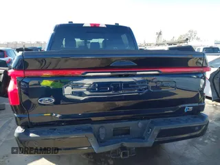 2022 Ford F-150 Lightning Pro z VIN 1FT6W1EV8NWG04113, wystawiony jako IAAI lot #41765532 z przebiegiem 48 990 mil mil oraz . Historia ofert i sprzedaży dostępna na DreamBid. Obrazek 16.