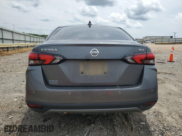 2021 Nissan Versa SV with VIN 3N1CN8EV3ML880947, listed as a Copart auction lot 60303965 with 98,646 mi miles and Salvage title. Bid and sale history available at DreamBid. Image 6.