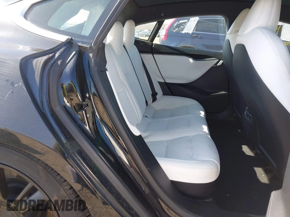2020 Tesla Model S Long Range with VIN 5YJSA1E23LF381872, listed as a IAAI auction lot 41763046 with 96,720 mi miles and . Bid and sale history available at DreamBid. Image 8.