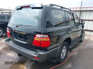 2000 Toyota Land Cruiser z VIN JT3HT05J1Y0081635, wystawiony jako IAAI lot #41938432 z przebiegiem 362 389 mil mil oraz . Historia ofert i sprzedaży dostępna na DreamBid. Obrazek 4.