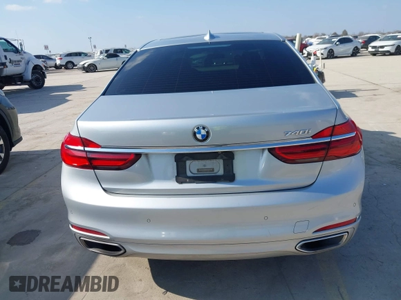 2016 BMW 7 Series 740i with VIN WBA7E2C5XGG739099, listed as a IAAI auction lot 41526038 with 123,900 mi miles. Bid and sale history available at carsss.com. Image 16.