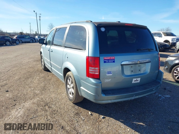 2010 Chrysler Town & Country Touring with VIN 2A4RR5D13AR308522, listed as a IAAI auction lot 41673246 with 125,647 mi miles. Bid and sale history available at carsss.com. Image 3.