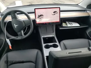 2023 Tesla Model 3 with VIN 5YJ3E1EA6PF563331, listed as a Copart auction lot 61124715 with 26,198 mi miles and Salvage title. Bid and sale history available at DreamBid. Image 8.