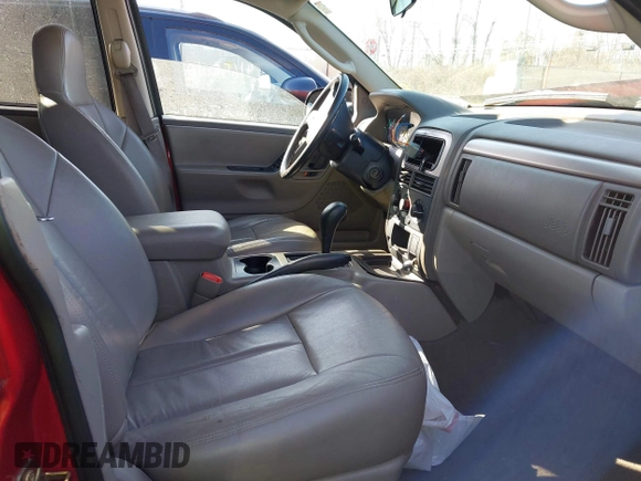 2003 Jeep Grand Cherokee Laredo with VIN 1J4GX48S13C594893, listed as a IAAI auction lot 41688597 with 179,680 mi miles. Bid and sale history available at carsss.com. Image 5.