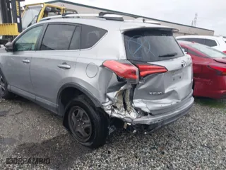 2016 Toyota RAV4 LE with VIN 2T3ZFREV5GW251763, listed as a IAAI auction lot 41655532 with 147,873 mi miles. Bid and sale history available at carsss.com. Image 3.