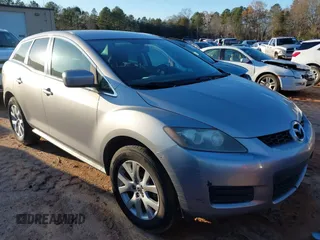 2009 Mazda CX-7 Sport with VIN JM3ER293290221298, listed as a IAAI auction lot 41067088 with 230,241 mi miles. Bid and sale history available at carsss.com. Image 1.