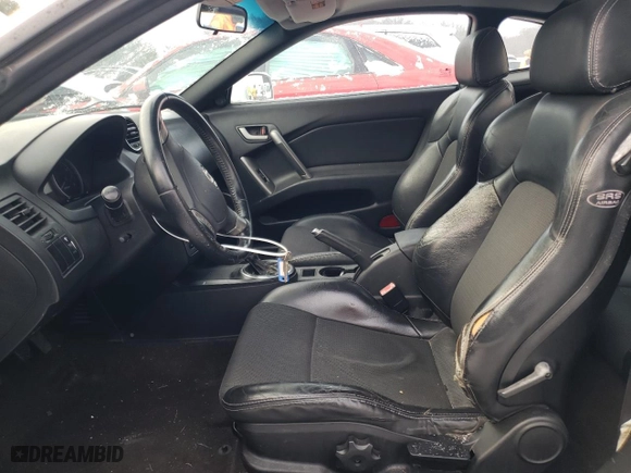 2008 Hyundai Tiburon GT with VIN KMHHN66F68U269896, listed as a Copart auction lot 87502765 with 196,437 mi miles and Salvage Title. Bid and sale history available at carsss.com. Image 7.