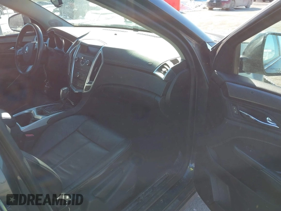2012 Cadillac SRX with VIN 3GYFNGE37CS530044, listed as a IAAI auction lot 41618205 with 205,267 mi miles and . Bid and sale history available at carsss.com. Image 5.