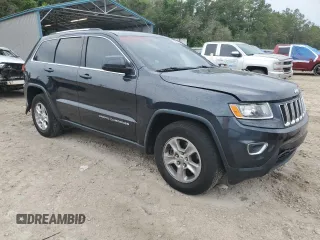 2014 Jeep Grand Cherokee Laredo with VIN 1C4RJEAGXEC130094, listed as a Copart auction lot 55997925 with 151,407 mi miles and Salvage Title. Bid and sale history available at DreamBid. Image 4.