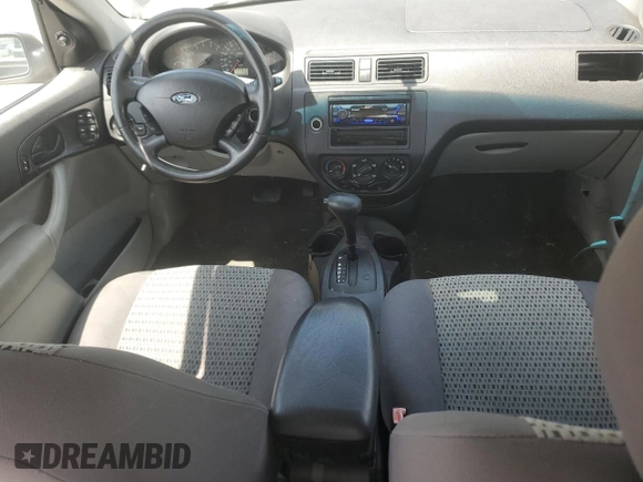 2006 Ford Focus S with VIN 1FAFP34N76W246035, listed as a Copart auction lot 61985015 with 196,498 mi miles and Salvage title. Bid and sale history available at DreamBid. Image 8.