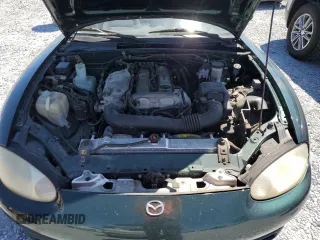 1999 Mazda MX-5 Miata with VIN JM1NB3530X0118452, listed as a Copart auction lot 53337575 with 150,574 mi miles and Clean title. Bid and sale history available at DreamBid. Image 11.