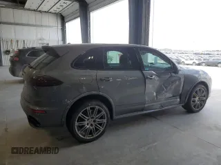 2016 Porsche Cayenne GTS с VIN WP1AD2A2XGLA80001, выставлен на аукционе Copart как лот 56706455 с пробегом 71 816 миль миль и Списание • Salvage title. История ставок и продаж доступна на DreamBid. Изображение 3.