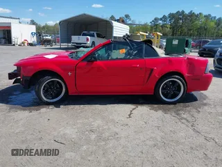 2003 Ford Mustang Deluxe z VIN 1FAFP44453F358762, wystawiony jako IAAI lot #42038789 z przebiegiem Nie podano mil oraz . Historia ofert i sprzedaży dostępna na DreamBid. Obrazek 14.