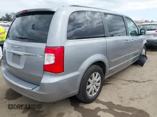 2014 Chrysler Town & Country Touring with VIN 2C4RC1BGXER123977, listed as a IAAI auction lot 42047133 with 150,046 mi miles. Bid and sale history available at carsss.com. Image 4.
