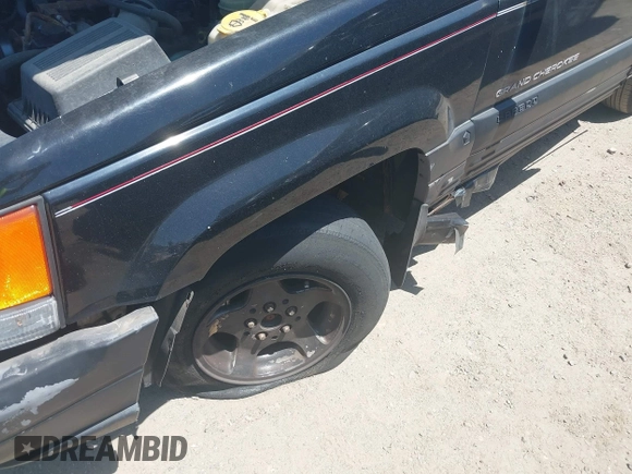 1997 Jeep Grand Cherokee Laredo with VIN 1J4GZ58S3VC508194, listed as a IAAI auction lot 42578622 with 146,559 mi miles and . Bid and sale history available at DreamBid. Image 12.