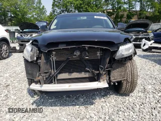 2015 Audi Q7 Premium Plus with VIN WA1LGAFE4FD003092, listed as a Copart auction lot 60500195 with 122,506 mi miles and Clean title. Bid and sale history available at DreamBid. Image 5.
