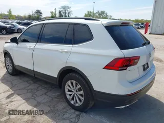 2019 Volkswagen Tiguan S with VIN 3VV0B7AX0KM027036, listed as a IAAI auction lot 42202681 with 75,192 mi miles and . Bid and sale history available at DreamBid. Image 3.